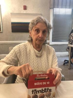 My sister Donna, who we recently lost to Alzheimer's, with one of her favorite treats!
